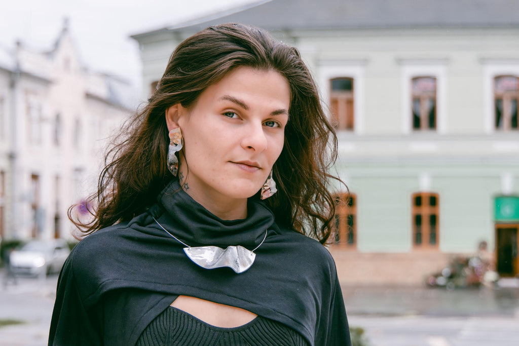 Black bolero sweater with a high collar, turtle neck