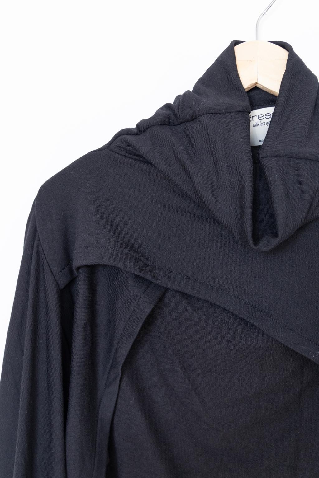 Black bolero sweater with a high collar, turtle neck