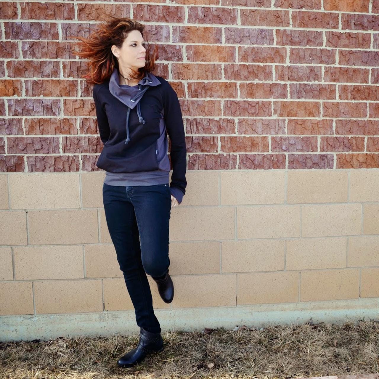 Black sweatshirt with a higher collar